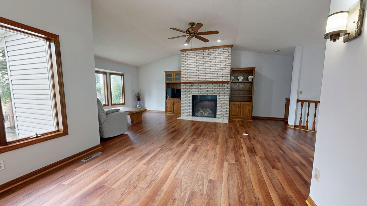 A beautifully renovated modern living room with high-quality finishes